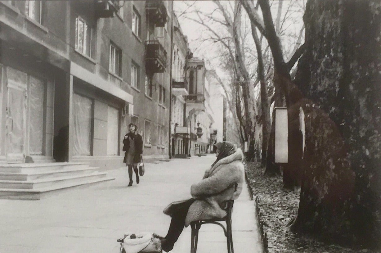 Woman Street Seller on a cold day, 22nd April 2003 — Nicholas Hopkins